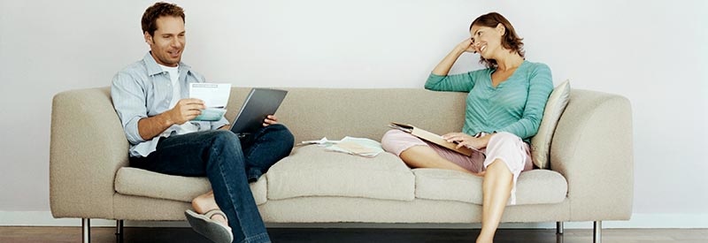 man and woman discussing the escrow process